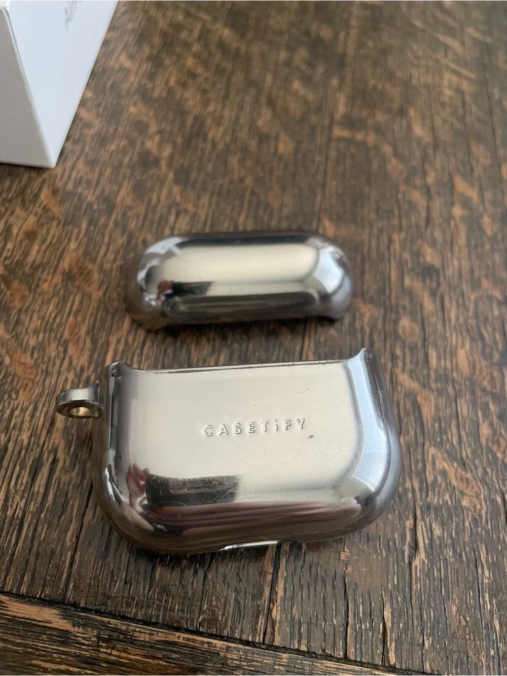 Apple White AirPods 3 with Charging Case and Silver Casetify Protective Case